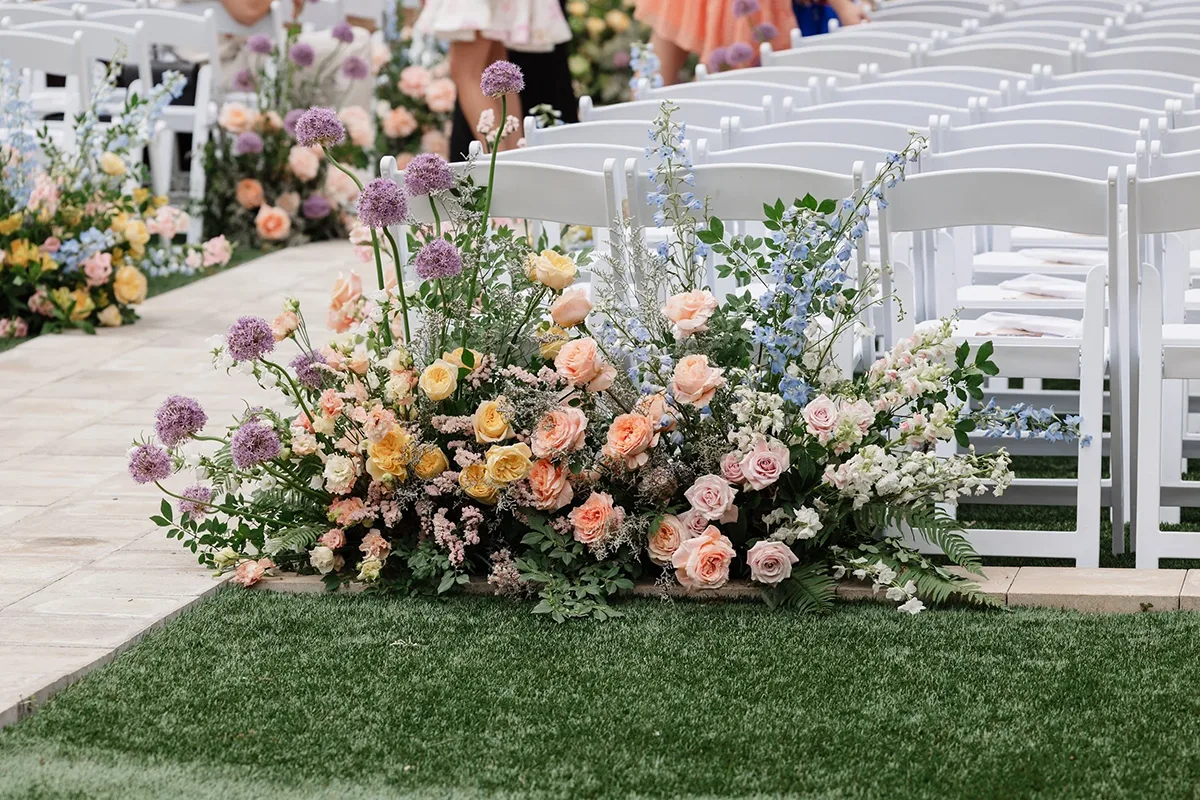 Upstate SC Wedding Venues: Greenville, Spartanburg & Beyond 2 Colorful floral arrangement near seating