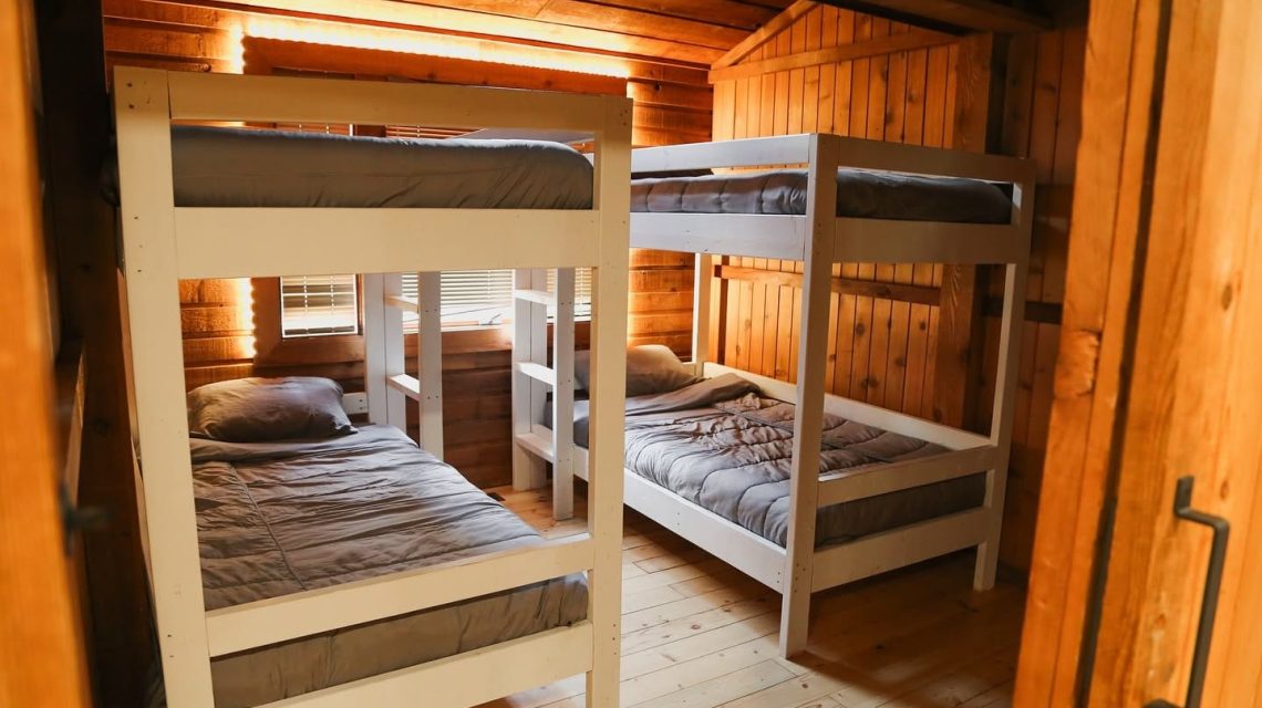Old Mill Village Camp 3 Wooden bunk beds in cozy room